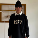POLO MANGA LARGA ESSENTIALS 1977 BLACK
